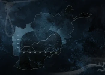 A rising line graph is laid over a map of Afghanistan and a dark silhouette, illustrating growing concern over suicide. (Photo credit: Exclusive + Magnific)