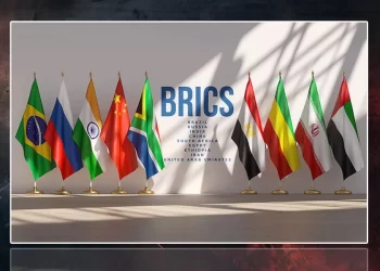 Flags of BRICS member states, including Brazil, Russia, India, China, South Africa, Egypt, Ethiopia, Iran and the United Arab Emirates, are displayed together ahead of the bloc's New Delhi summit. (Photo credit: Chicagopolicereview)