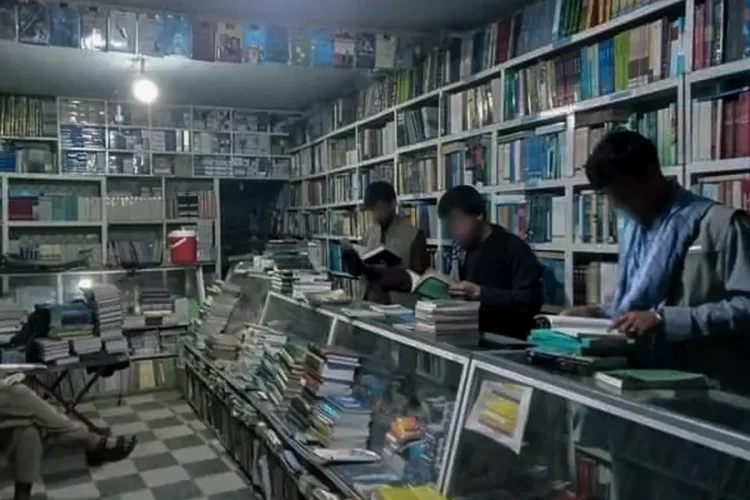 Customers browse shelves at a bookstore in Badakhshan as booksellers report a sharp decline in sales and a fading culture of reading. (Photo credit: Exclusive)