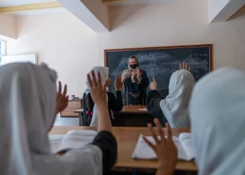 Students attend a literacy class as a teacher leads a lesson in a classroom in Afghanistan. (Photo credit: X/EUinAfghanistan)