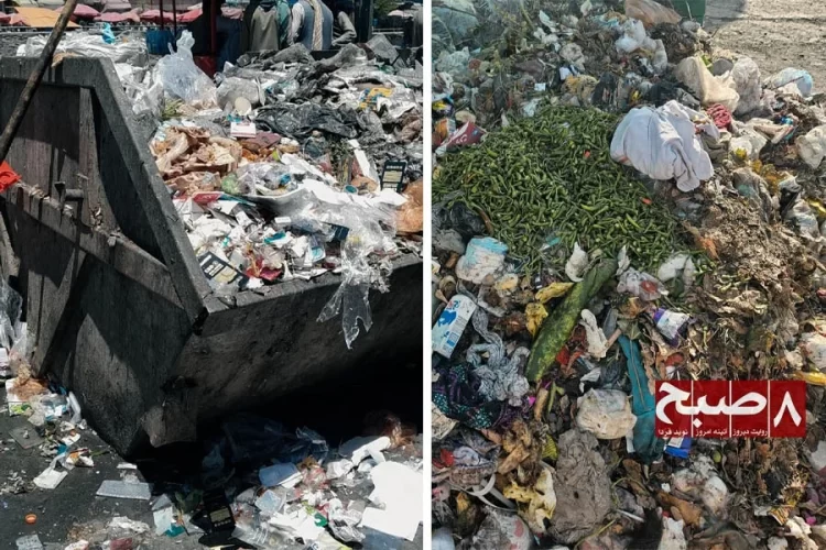 Piles of discarded food and waste sit uncollected in an open dumpster and on the ground in Afghanistan, raising environmental and health concerns. (Photo credit: 8am.media)