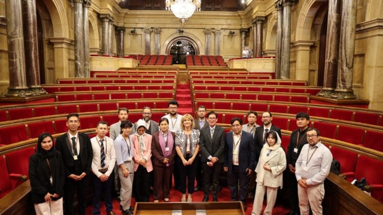 Representatives and activists from the Hazara community pose for a group photo during a meeting in the Parliament of Catalonia. (Photo Credit: Exclusive)