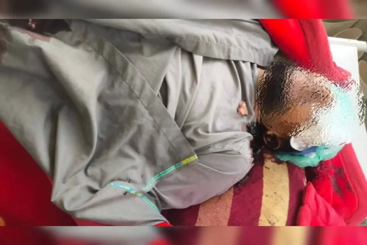 A man lies inside a government hospital in Uruzgan after being shot dead by unidentified gunmen. (Photo credit: Exclusive)