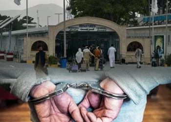 A man in handcuffs is pictured against the backdrop of Kabul's international airport departures terminal, as returnees face arrest over alleged criticism of the Taliban. (Photo credit: AFP + Pexels)