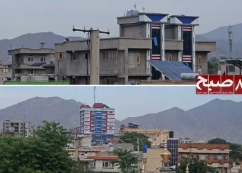 High-rise apartment buildings rise above residential neighborhoods in Kabul, overlooking nearby homes and courtyards. (Photo credit: 8am.media)