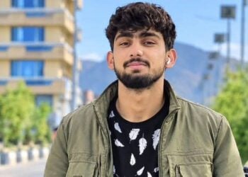 A young man, Shoaib, pictured on a sunny day in Kabul before he was killed by armed robbers. (Photo credit: Exclusive)
