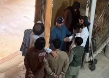 People arrested by the Taliban are seen from above in Kandahar following a crackdown on money exchange workers. (Photo credit: Exclusive)