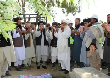 Men gather and pray during a ceremony marking the launch of a development project in Kapisa. (Photo credit: @bnadari1)