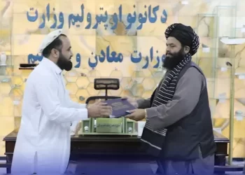 Taliban officials and a private company representative hold a contract for the extraction of a talc mine in Nangarhar. (Photo credit: X/MoMPMinistryAFG)