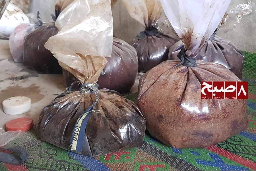 Plastic bags filled with raw opium resin are stacked on a woven mat as reports point to a thriving opium trade in Helmand. (Photo credit: 8am.media)