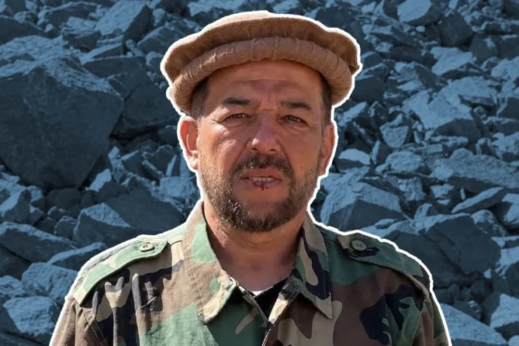 Saleh Mohammad Rigestani, General Military Commander of the National Resistance Front (NRF), stands in a camouflage uniform before a rocky mountain slope in a video released from the Hindu Kush. (Photo credit: Social Media)