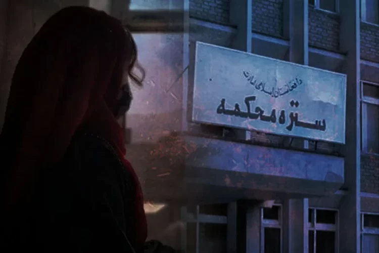 A woman looks toward the Taliban's Supreme Court building, where many women say their divorce requests have been rejected despite evidence of domestic violence. (Photo credit: Rukhshana + NUG)