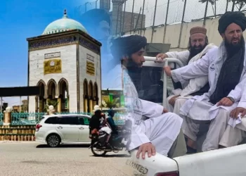 Taliban fighters patrol a street in Kandahar, where residents say beard checks and phone searches have intensified. (Photo credit: 8am.media + BBC)