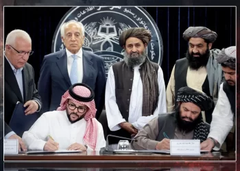 A Taliban minister and a Saudi company representative sign the Kashk–Tirpul oil and gas contract as officials look on. (Photo credit: Social Media)