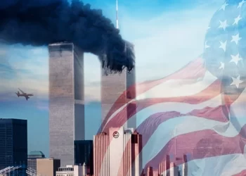 Smoke billows from the World Trade Center towers during the September 11, 2001 attacks, marking the start of America's war in Afghanistan. (Photo credit: Maureen Dahill)