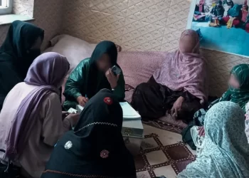 Women gather in a small workshop in Kabul, sewing and embroidering fabric as part of a network that has given dozens of women a path to financial independence. (Photo credit: Exclusive)