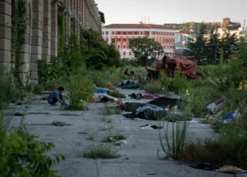 Migrants from Afghanistan sleep in an open space in Italy amid challenges including low wages, employment discrimination and high living costs. (Photo credit: AFP)