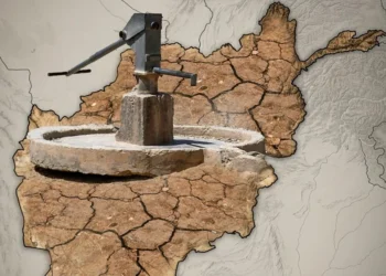 A hand water pump stands over a cracked, drought-hit map of Afghanistan as warnings grow over Kabul’s dwindling groundwater. (Photo Credit: AFP + Magnific)