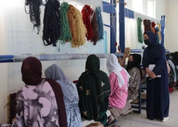Women participate in a carpet-weaving training programme in Bamyan Province supported by the United Nations High Commissioner for Refugees (UNHCR). (Photo credit: UNHCR)