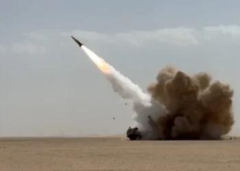 A rocket launching in a desert area leaving a large pile of smoke behind (Photo: US CENTRAL COMMAND (CENTCOM) / AFP) 