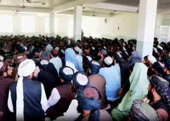 Students sit in a hall at a madrasa in Helmand amid reports that Taliban members receive better educational facilities than ordinary students. (Photo credit: Exclusive)