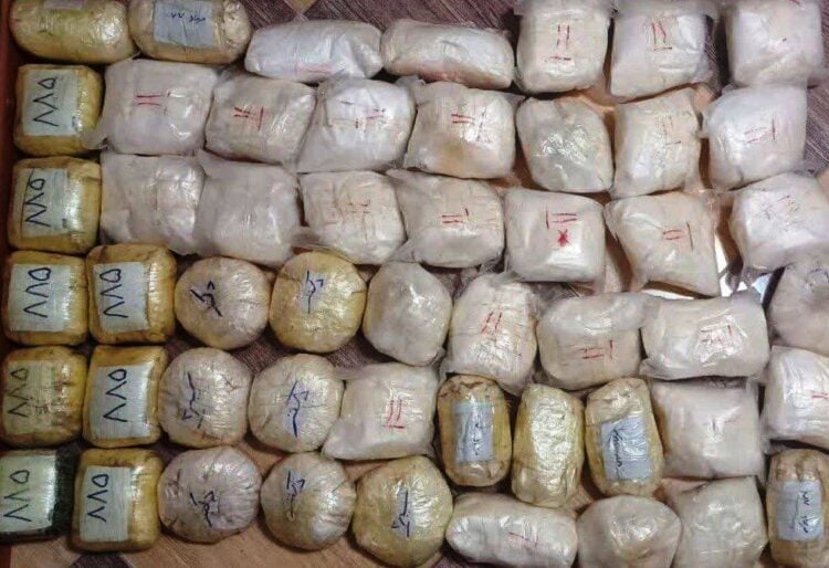 Stacks of seized narcotics, including opium, heroin and synthetic drugs, as Iranian officials report a fourfold rise in seizures along the Afghanistan border. (Photo credit: IRNA)