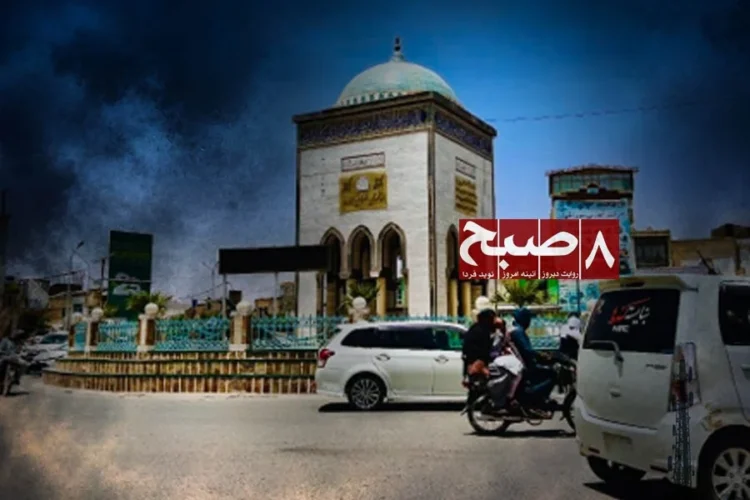 Cars and a motorcycle pass through a busy intersection in Kandahar city amid rising traffic accidents and disorder. (Photo credit: 8am.media)