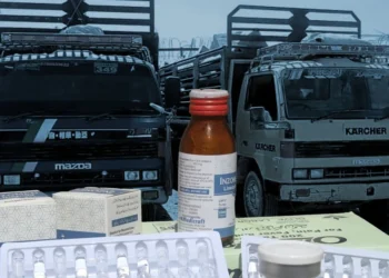 Cargo trucks and Pakistani medicine boxes and bottles are seen in a collage, as smuggled medicines continue to reach Afghanistan’s markets despite the import ban. (Photo credit: Exclusive)