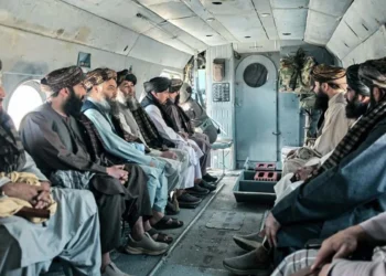 Men in turbans sit inside a helicopter cabin during a Taliban official's tour of northern provinces amid rising anti-Taliban attacks. (Photo credit: didpress)