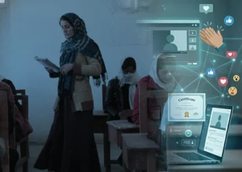 A teacher reads to girls seated at wooden desks in an Afghanistan classroom, with digital icons showing online Teachers' Day celebrations. (Photo credit: AKDN + Magnific)