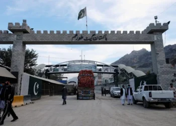 A truck loaded with goods stands at the Pakistani gate of the Torkham crossing as trade between Afghanistan and Pakistan remains suspended. (Photo credit: Reuters)