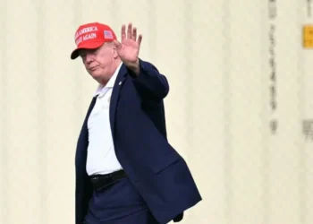 US President Donald Trump waves to the camera from a distance amid criticism of the Nobel Committee’s decision to award this year’s Peace Prize to Navi Pillay. (Photo credit: AFP)