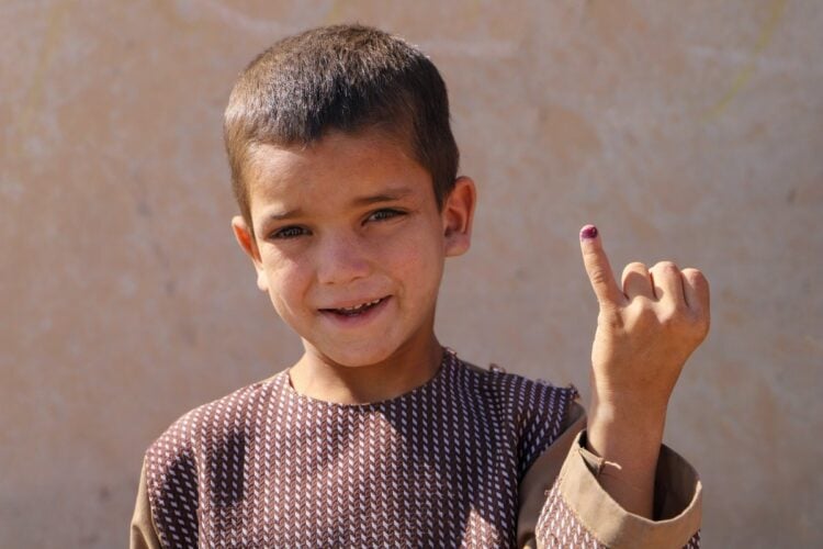 A child’s finger is marked with ink after receiving the polio vaccine. (Photo: Polio Free Afghanistan)
