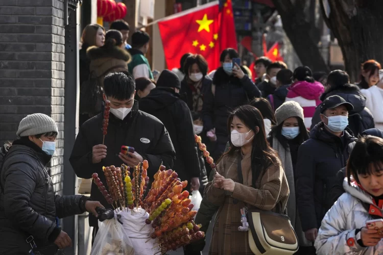 Andy Wong/AP