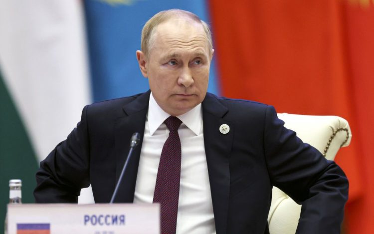 Sergei Bobylev / Sputnik, Kremlin Pool via AP